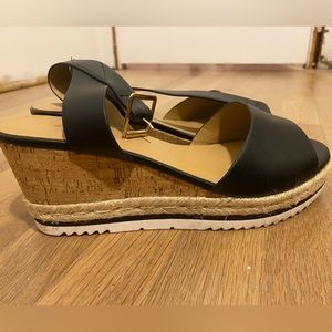 Black wedge sandals.